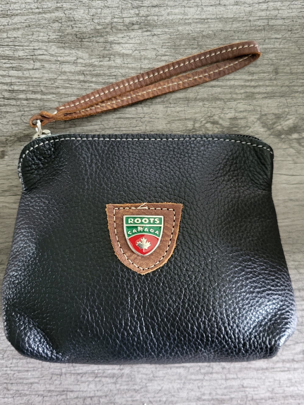 Roots Black Leather Wristlet with Brown Accent